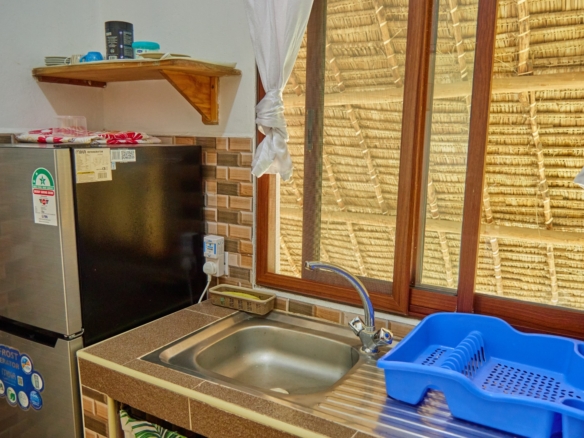 Fully furnished 2-bedroom duplex cottage for sale at Park Marine Villas, Silversands Road Malindi. Each floor has a bedroom. Steps to beach, 2 pools. €125,000.