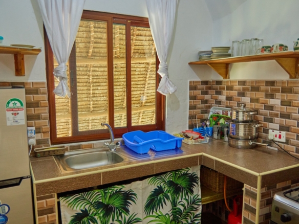 Fully furnished 2-bedroom duplex cottage for sale at Park Marine Villas, Silversands Road Malindi. Each floor has a bedroom. Steps to beach, 2 pools. €125,000.