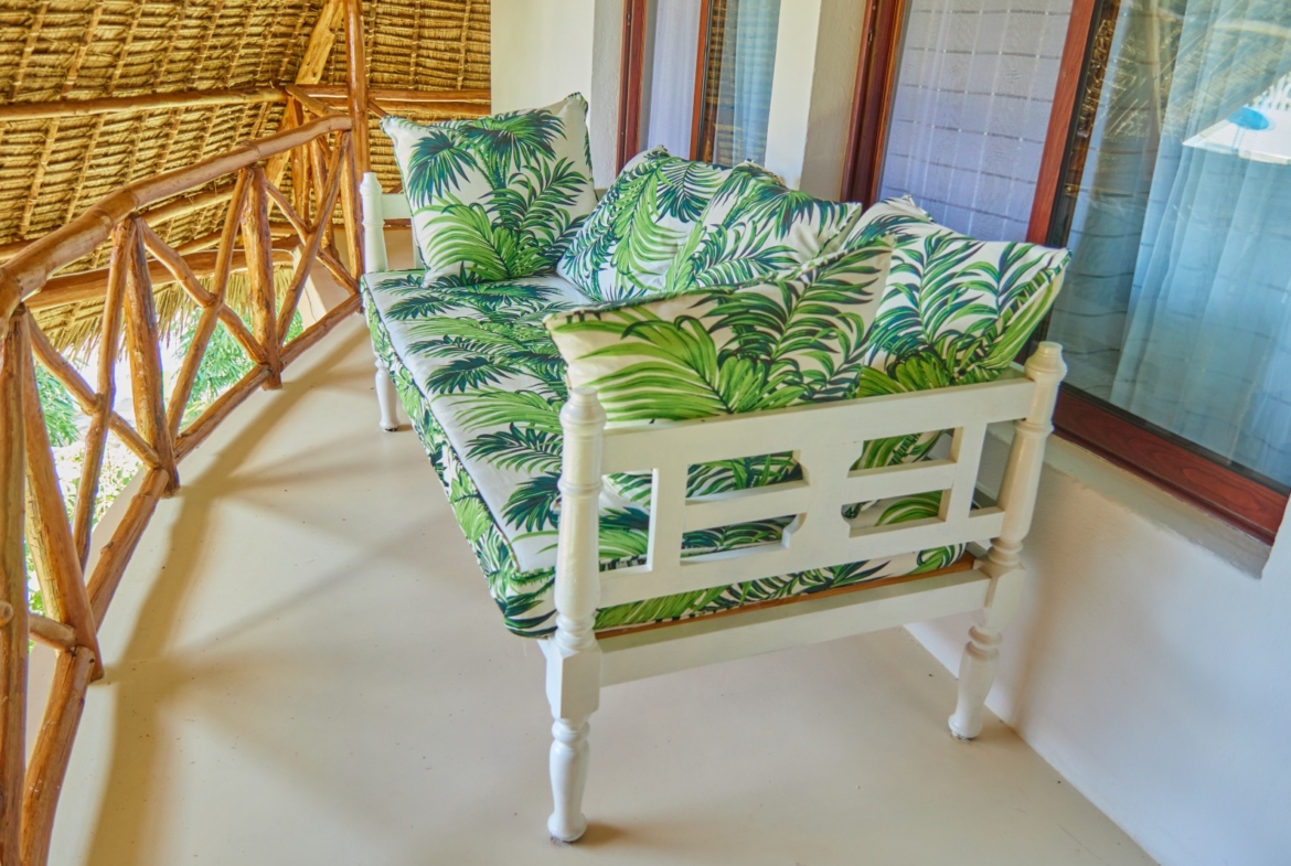 Fully furnished 2-bedroom duplex cottage for sale at Park Marine Villas, Silversands Road Malindi. Each floor has a bedroom. Steps to beach, 2 pools. €125,000.