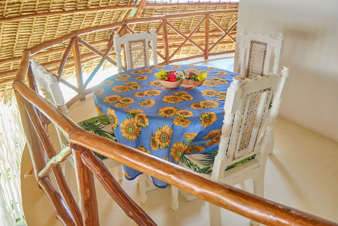 Fully furnished 2-bedroom duplex cottage for sale at Park Marine Villas, Silversands Road Malindi. Each floor has a bedroom. Steps to beach, 2 pools. €125,000.