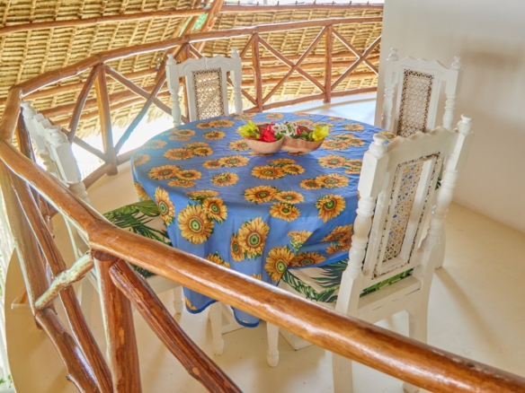 Fully furnished 2-bedroom duplex cottage for sale at Park Marine Villas, Silversands Road Malindi. Each floor has a bedroom. Steps to beach, 2 pools. €125,000.