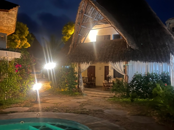 Fully furnished 2-bedroom duplex cottage for sale at Park Marine Villas, Silversands Road Malindi. Each floor has a bedroom. Steps to beach, 2 pools. €125,000.