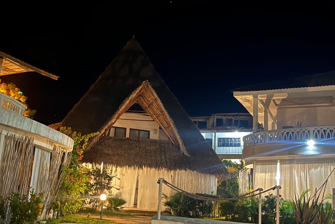 Fully furnished 2-bedroom duplex cottage for sale at Park Marine Villas, Silversands Road Malindi. Each floor has a bedroom. Steps to beach, 2 pools. €125,000.