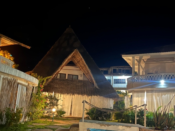 Fully furnished 2-bedroom duplex cottage for sale at Park Marine Villas, Silversands Road Malindi. Each floor has a bedroom. Steps to beach, 2 pools. €125,000.