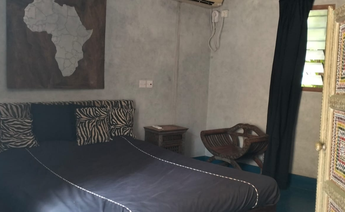 For Sale: Furnished 4BR Moroccan-style beachfront villa on Silversands Beach, Malindi. Ocean-view Jacuzzi, pool, DSQ, art-filled garden. USD 500K.