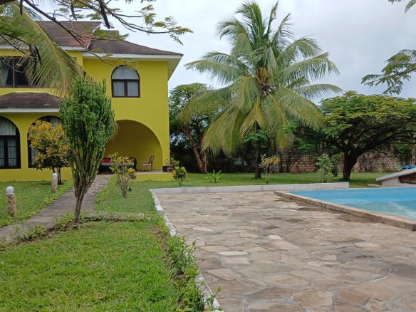 3-bedroom furnished villa for rent in Malindi, off Lamu Road next to Galana Petrol Station, with landscaped garden and shared swimming pool.