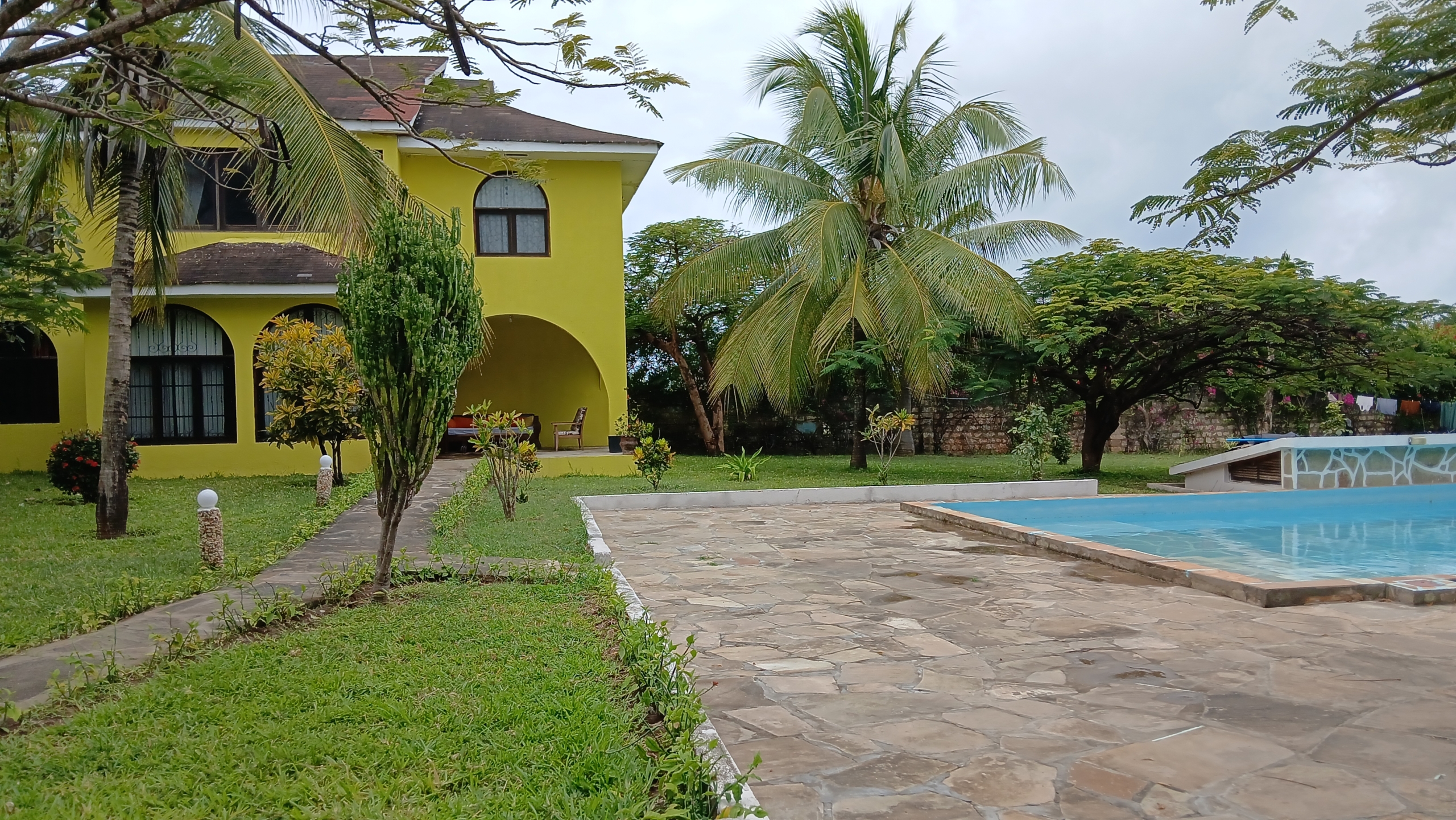 3-bedroom furnished villa for rent in Malindi, off Lamu Road next to Galana Petrol Station, with landscaped garden and shared swimming pool.