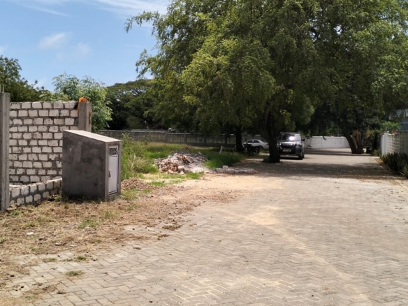“Gated half-acre plot for sale inside Fahari Residence, Malindi – secure and serviced coastal property.”