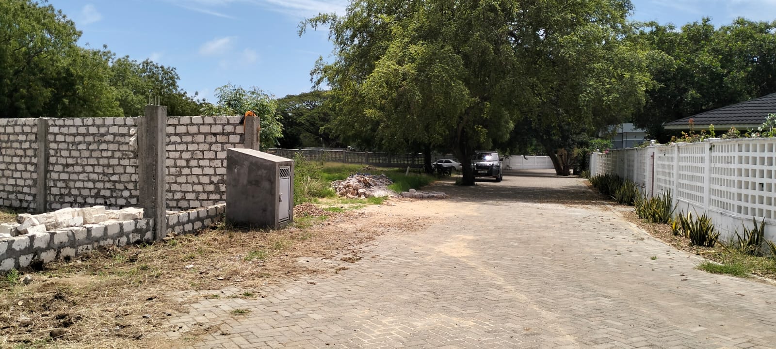 “Gated half-acre plot for sale inside Fahari Residence, Malindi – secure and serviced coastal property.”