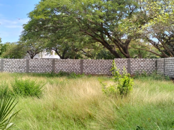 “Gated half-acre plot for sale inside Fahari Residence, Malindi – secure and serviced coastal property.”