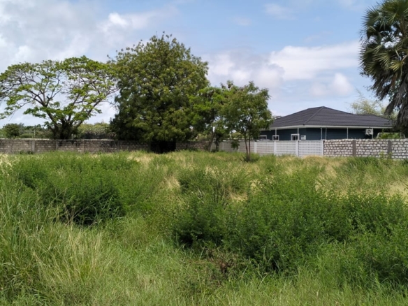 “Gated half-acre plot for sale inside Fahari Residence, Malindi – secure and serviced coastal property.”
