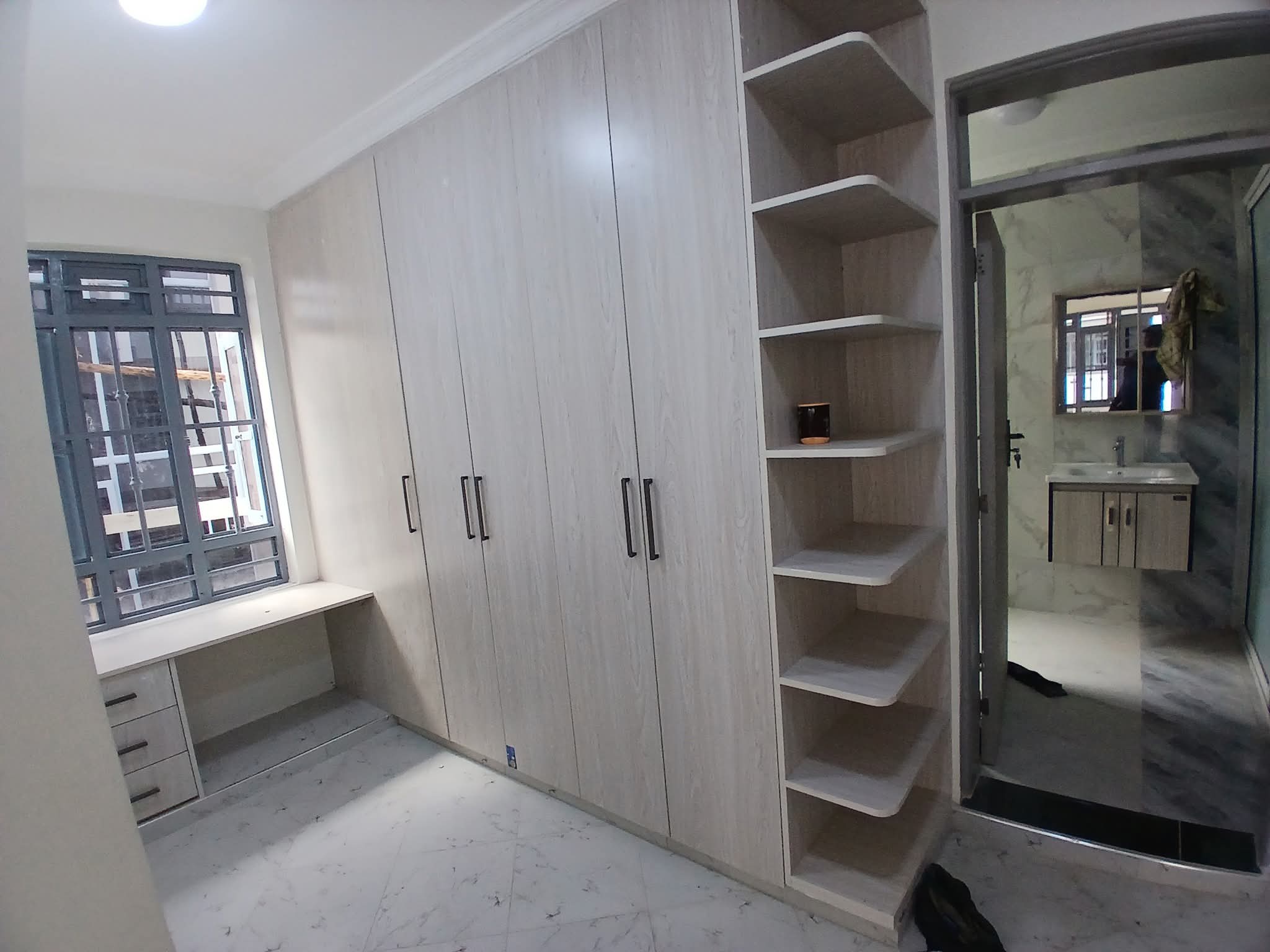 Executive 4-bedroom all-en-suite mansion for sale in Ruiru Mugutha. Gated community of 6 units, 40/80 plot, smart lighting, fitted kitchen, DSQ, and solar heating. Only 3.5 km from Thika Road. Asking KSh 22M.