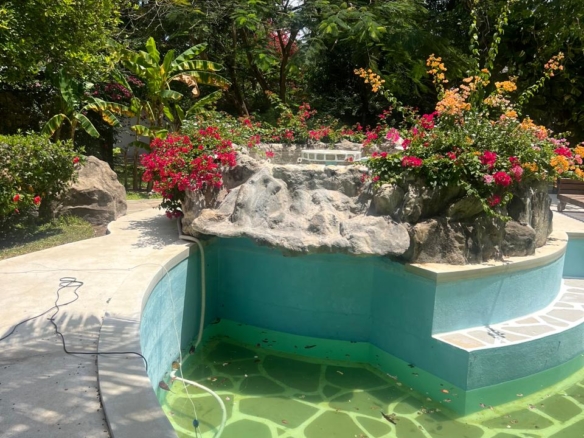 Prime 4-bedroom coastal home for sale in Kibokoni with a 2-bedroom guest suite earning USD 100 per night. Nearly half-acre plot, ideal for investors and families.