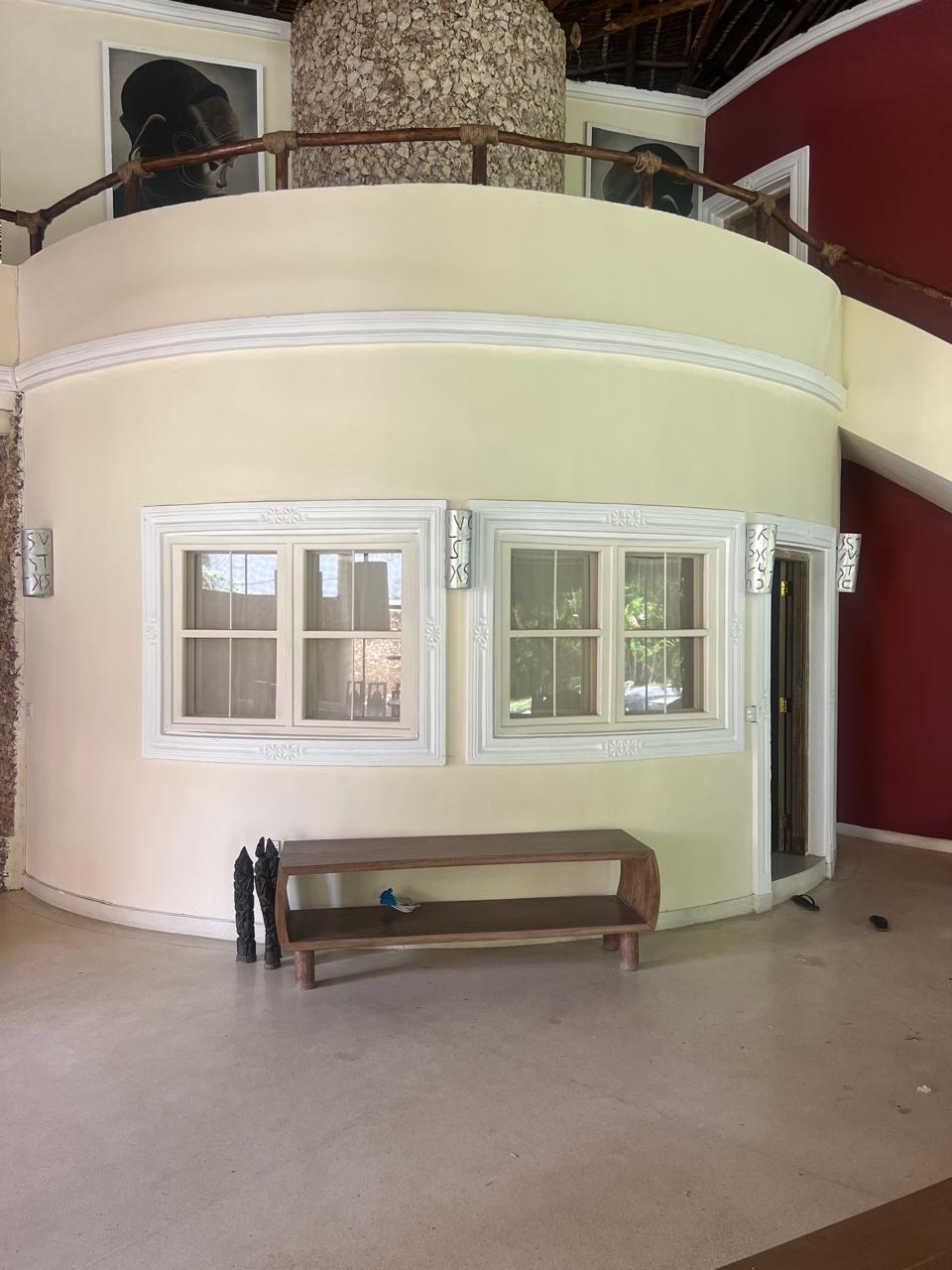 Prime 4-bedroom coastal home for sale in Kibokoni with a 2-bedroom guest suite earning USD 100 per night. Nearly half-acre plot, ideal for investors and families.