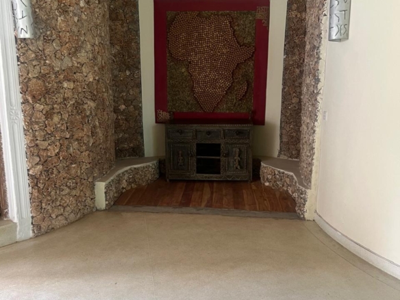 Prime 4-bedroom coastal home for sale in Kibokoni with a 2-bedroom guest suite earning USD 100 per night. Nearly half-acre plot, ideal for investors and families.