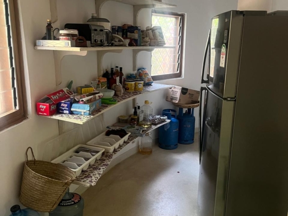 Prime 4-bedroom coastal home for sale in Kibokoni with a 2-bedroom guest suite earning USD 100 per night. Nearly half-acre plot, ideal for investors and families.