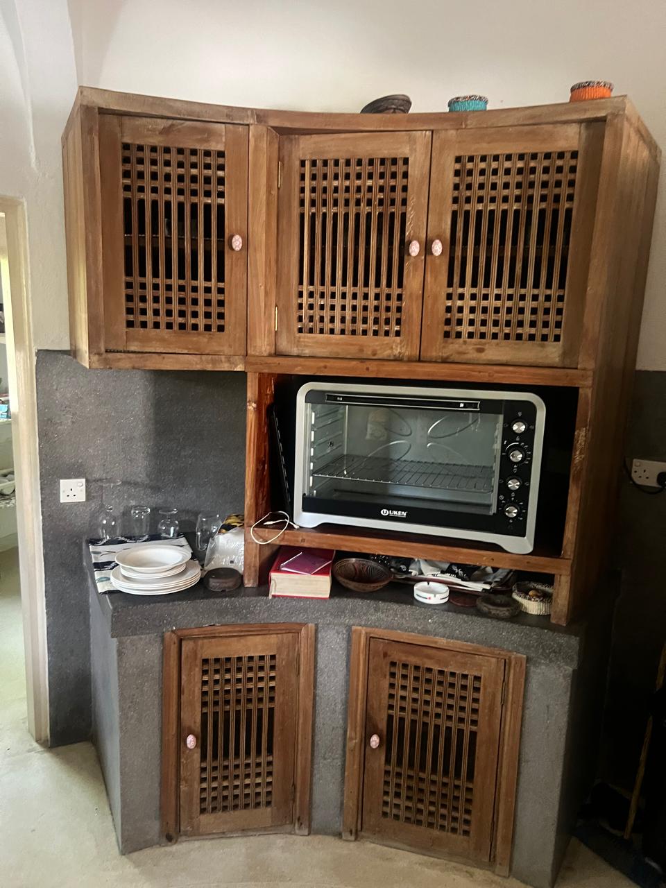 Prime 4-bedroom coastal home for sale in Kibokoni with a 2-bedroom guest suite earning USD 100 per night. Nearly half-acre plot, ideal for investors and families.