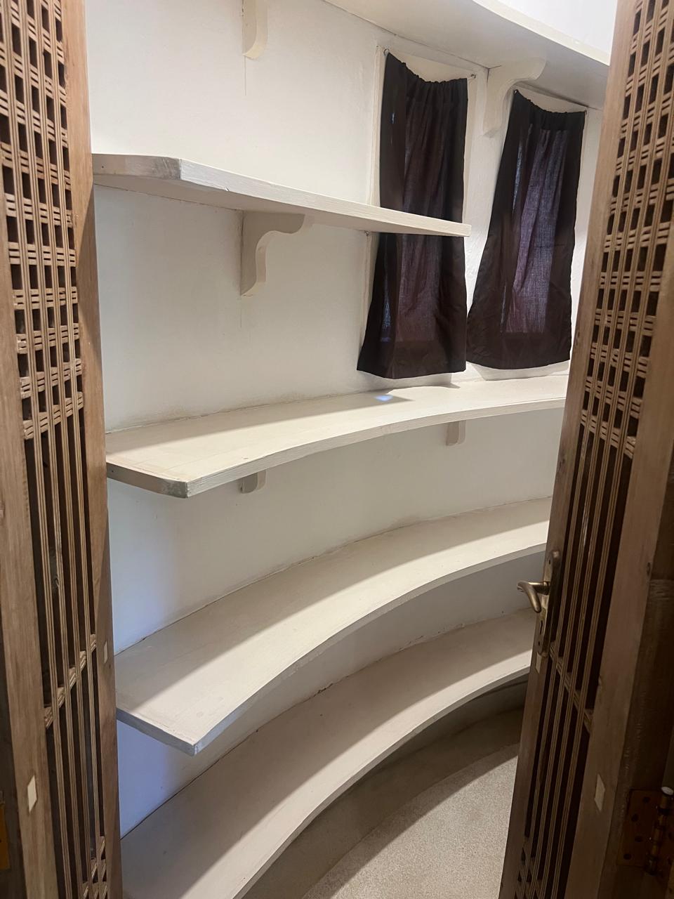 Prime 4-bedroom coastal home for sale in Kibokoni with a 2-bedroom guest suite earning USD 100 per night. Nearly half-acre plot, ideal for investors and families.