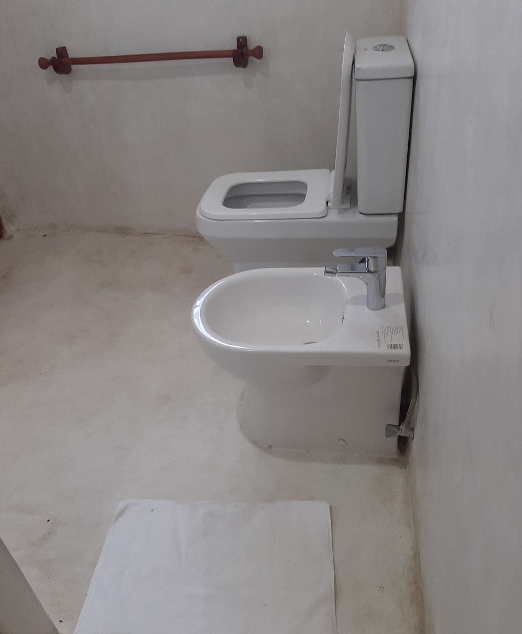 Luxury 2-bedroom guest suite in Mayungu, Malindi featuring ocean views, ensuite rooms, shared kitchen, furnished patio, tropical gardens, and a pristine swimming pool. Perfect self-catering coastal accommodation for only USD 100 per night.