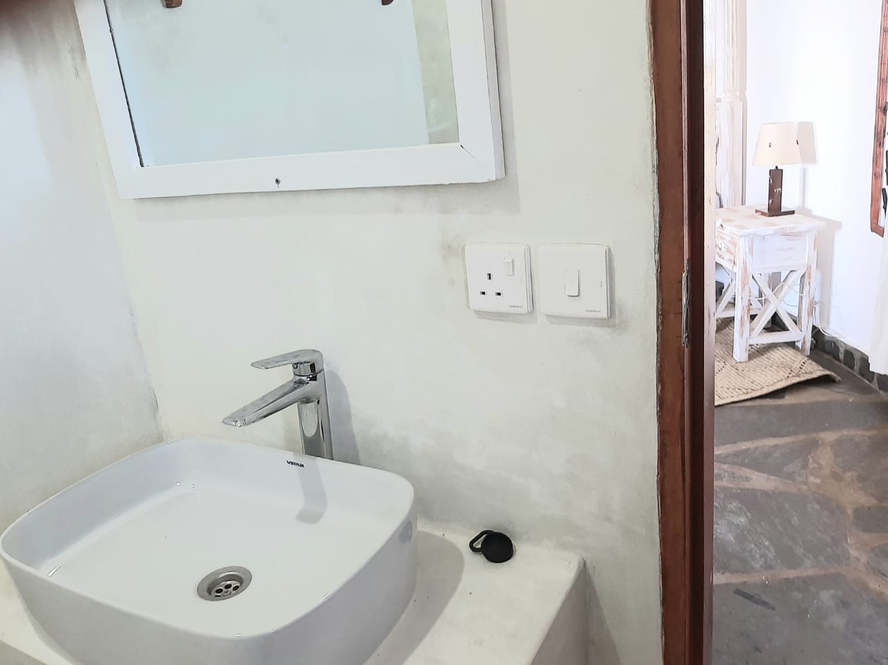 Luxury 2-bedroom guest suite in Mayungu, Malindi featuring ocean views, ensuite rooms, shared kitchen, furnished patio, tropical gardens, and a pristine swimming pool. Perfect self-catering coastal accommodation for only USD 100 per night.