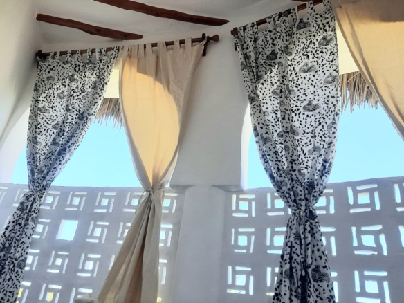 Luxury 2-bedroom guest suite in Mayungu, Malindi featuring ocean views, ensuite rooms, shared kitchen, furnished patio, tropical gardens, and a pristine swimming pool. Perfect self-catering coastal accommodation for only USD 100 per night.