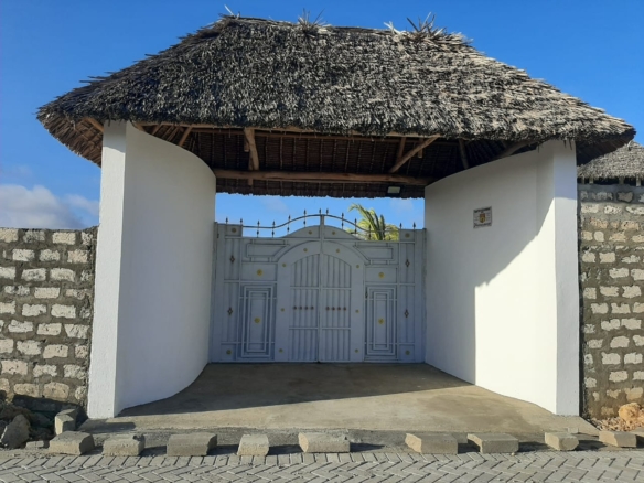 Luxury 2-bedroom guest suite in Mayungu, Malindi featuring ocean views, ensuite rooms, shared kitchen, furnished patio, tropical gardens, and a pristine swimming pool. Perfect self-catering coastal accommodation for only USD 100 per night.