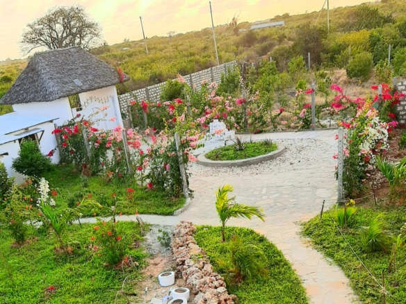 Luxury 2-bedroom guest suite in Mayungu, Malindi featuring ocean views, ensuite rooms, shared kitchen, furnished patio, tropical gardens, and a pristine swimming pool. Perfect self-catering coastal accommodation for only USD 100 per night.