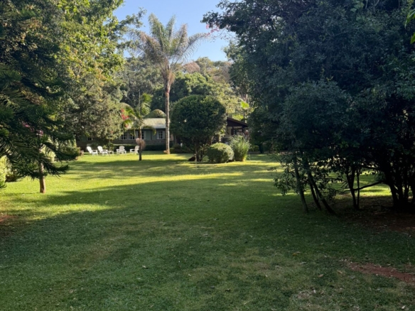 Luxurious 4.45-acre estate in Hardy, Langata with three houses, pool, borehole, solar power, and premier security. Set along Milima Road. Ideal for luxury living or investment.
