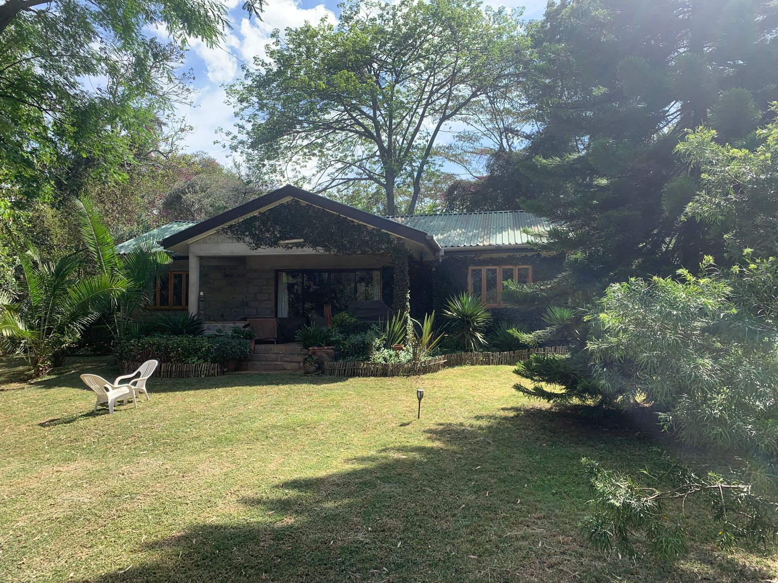 Luxurious 4.45-acre estate in Hardy, Langata with three houses, pool, borehole, solar power, and premier security. Set along Milima Road. Ideal for luxury living or investment.