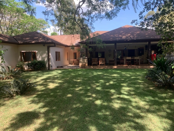 Luxurious 4.45-acre estate in Hardy, Langata with three houses, pool, borehole, solar power, and premier security. Set along Milima Road. Ideal for luxury living or investment.