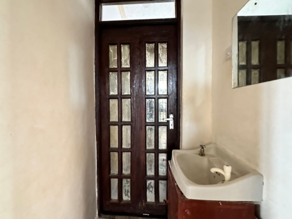 Modern 2-bedroom apartment for rent on Casuarina Road, Malindi. Prime location near Kilili Baharini, offering comfort, security, and convenience at KSh 30,000 monthly.