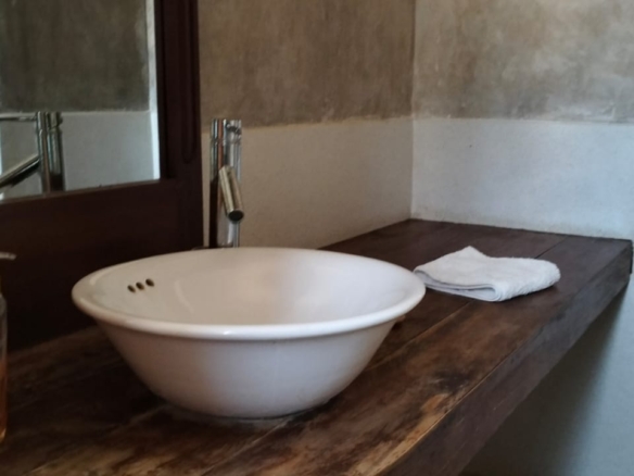 Luxury furnished 1-bedroom apartment for sale in Malindi, located at Beverly Suite on Silversands Road. Perfect for Airbnb, holiday homes, or investment. Prime coastal location with strong rental demand.