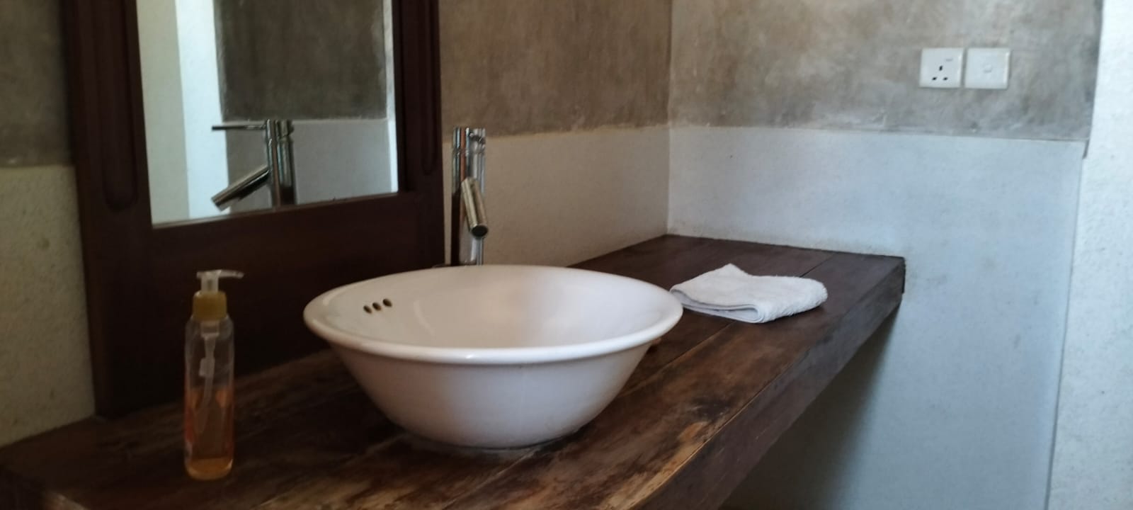 Luxury furnished 1-bedroom apartment for sale in Malindi, located at Beverly Suite on Silversands Road. Perfect for Airbnb, holiday homes, or investment. Prime coastal location with strong rental demand.