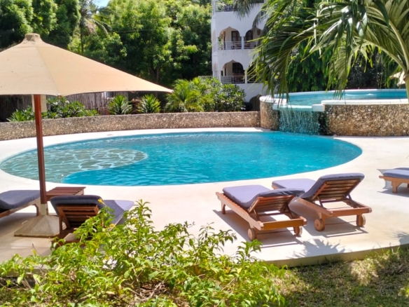 Luxury furnished 1-bedroom apartment for sale in Malindi, located at Beverly Suite on Silversands Road. Perfect for Airbnb, holiday homes, or investment. Prime coastal location with strong rental demand.