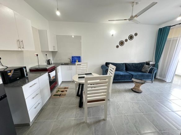 Luxury 1-bedroom coastal apartment with pool, balcony, and beach access near Malindi and Watamu.
