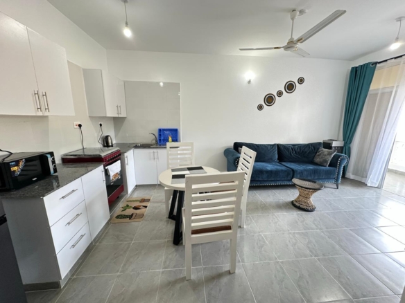 Luxury 1-bedroom coastal apartment with pool, balcony, and beach access near Malindi and Watamu.