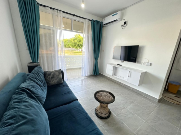 Luxury 1-bedroom coastal apartment with pool, balcony, and beach access near Malindi and Watamu.
