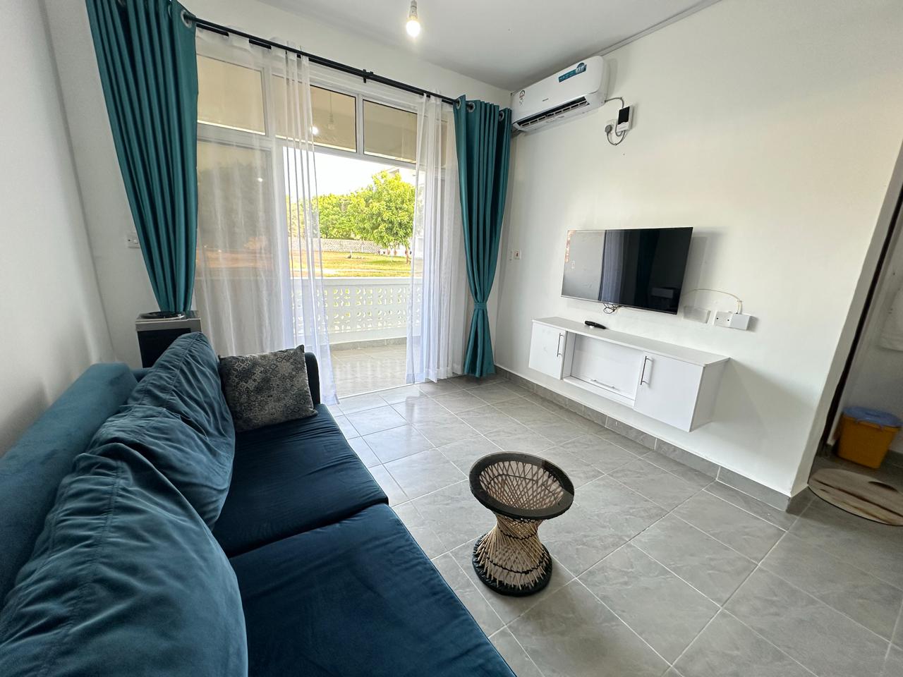 Luxury 1-bedroom coastal apartment with pool, balcony, and beach access near Malindi and Watamu.