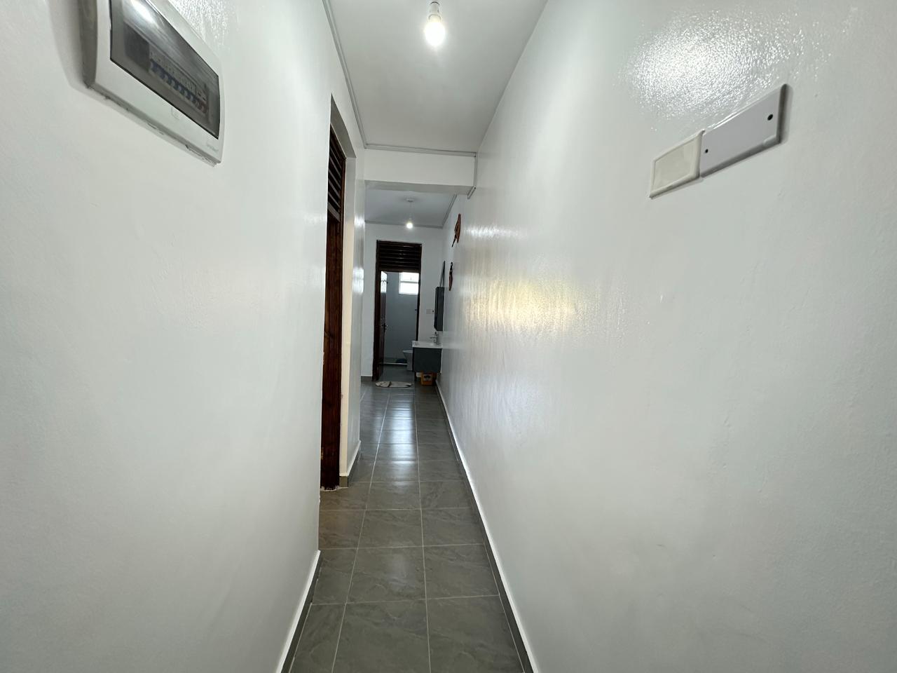Luxury 1-bedroom coastal apartment with pool, balcony, and beach access near Malindi and Watamu.