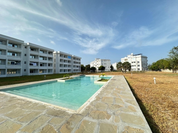 Luxury 1-bedroom coastal apartment with pool, balcony, and beach access near Malindi and Watamu.