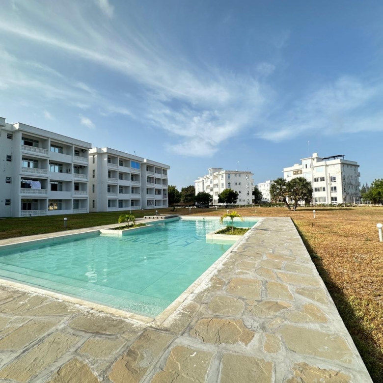 Luxury 1-bedroom coastal apartment with pool, balcony, and beach access near Malindi and Watamu.