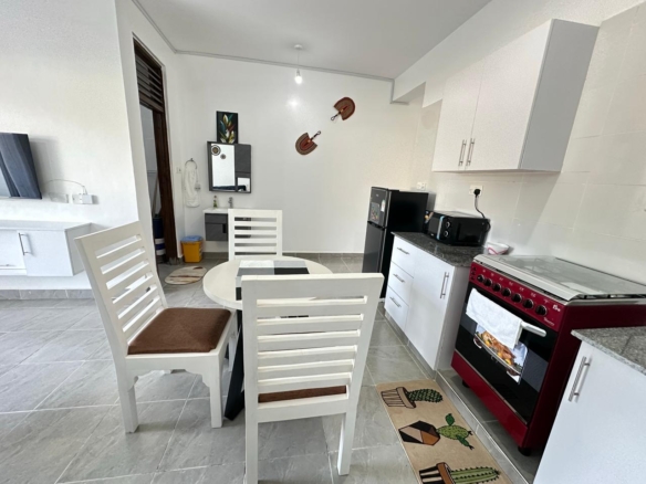 Luxury 1-bedroom coastal apartment with pool, balcony, and beach access near Malindi and Watamu.