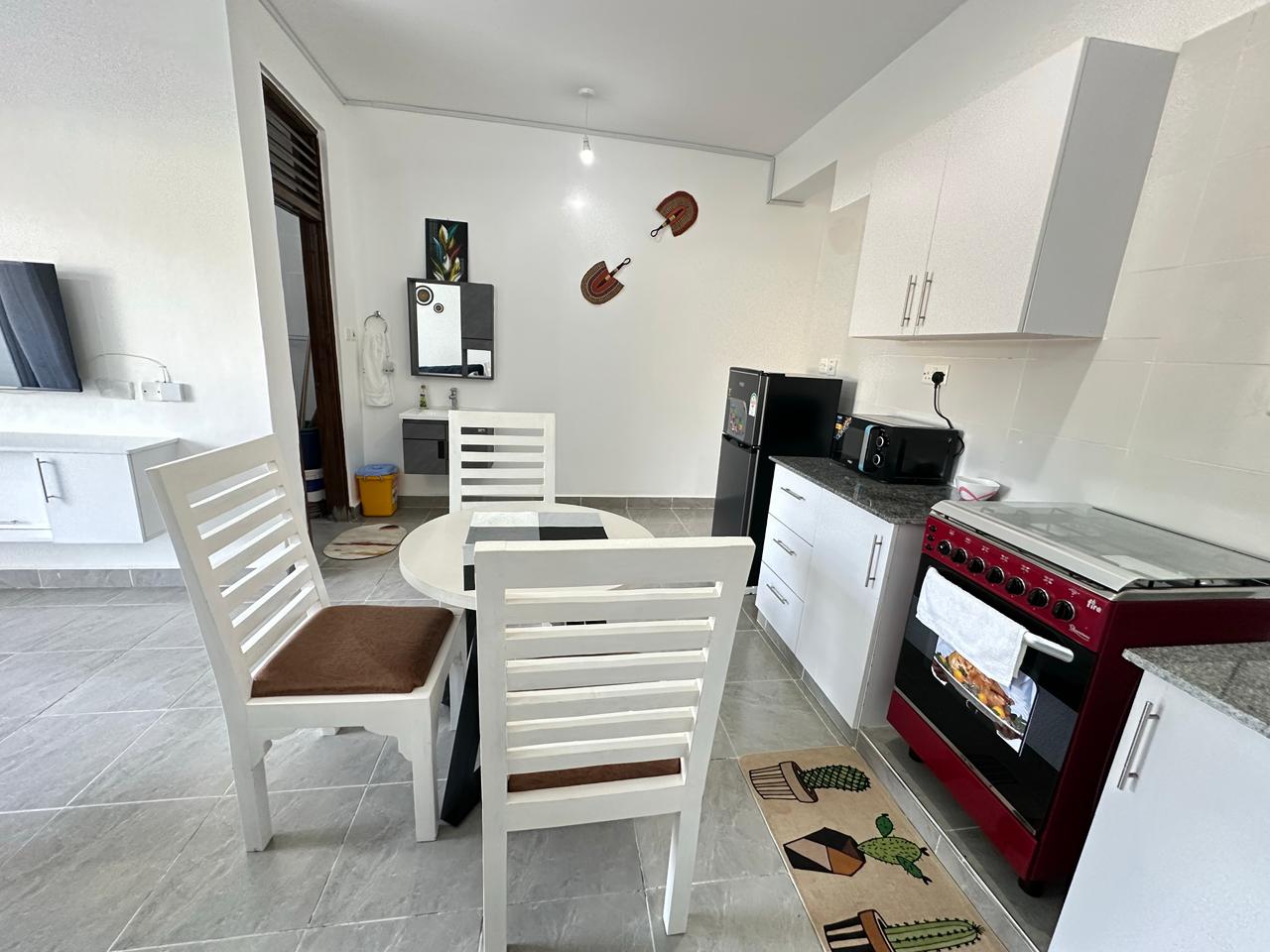 Luxury 1-bedroom coastal apartment with pool, balcony, and beach access near Malindi and Watamu.