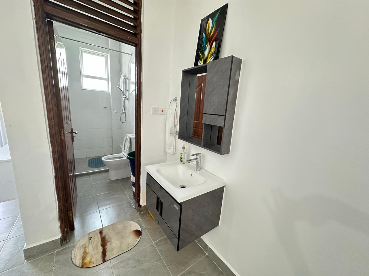 Luxury 1-bedroom coastal apartment with pool, balcony, and beach access near Malindi and Watamu.