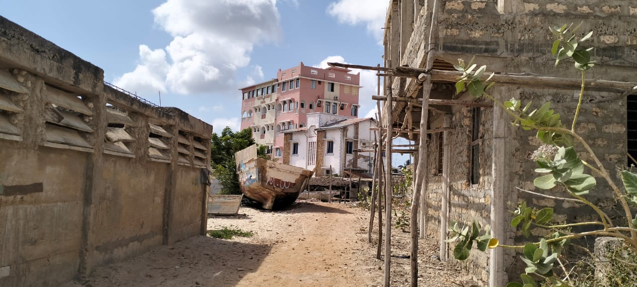 Quarter-acre second-row beach plot for sale in Lamu Wyoni with foundation and well, ideal for luxury coastal living or investment.