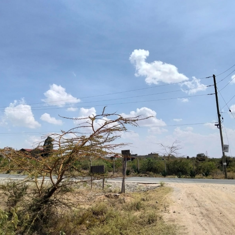 Five-acre land for sale near Daystar University in Lukenya with ready title deed, ideal for development.