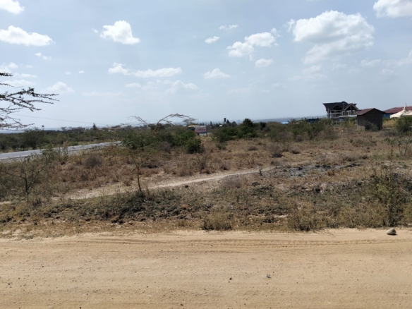 Five-acre land for sale near Daystar University in Lukenya with ready title deed, ideal for development.