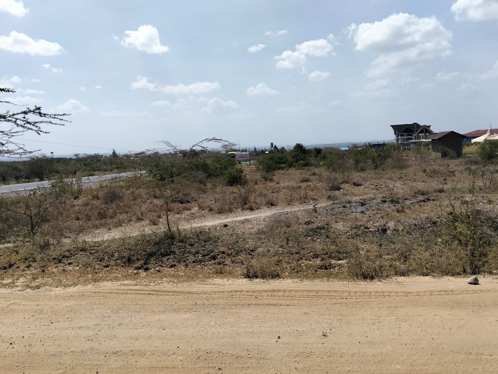 Five-acre land for sale near Daystar University in Lukenya with ready title deed, ideal for development.
