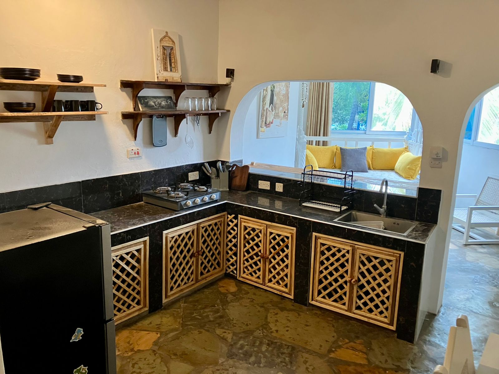 1.5-bedroom beachfront apartment at Oasis Malindi with ocean and pool views, available for short- and long-term rent.