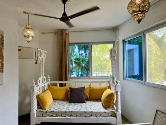 1.5-bedroom beachfront apartment at Oasis Malindi with ocean and pool views, available for short- and long-term rent.